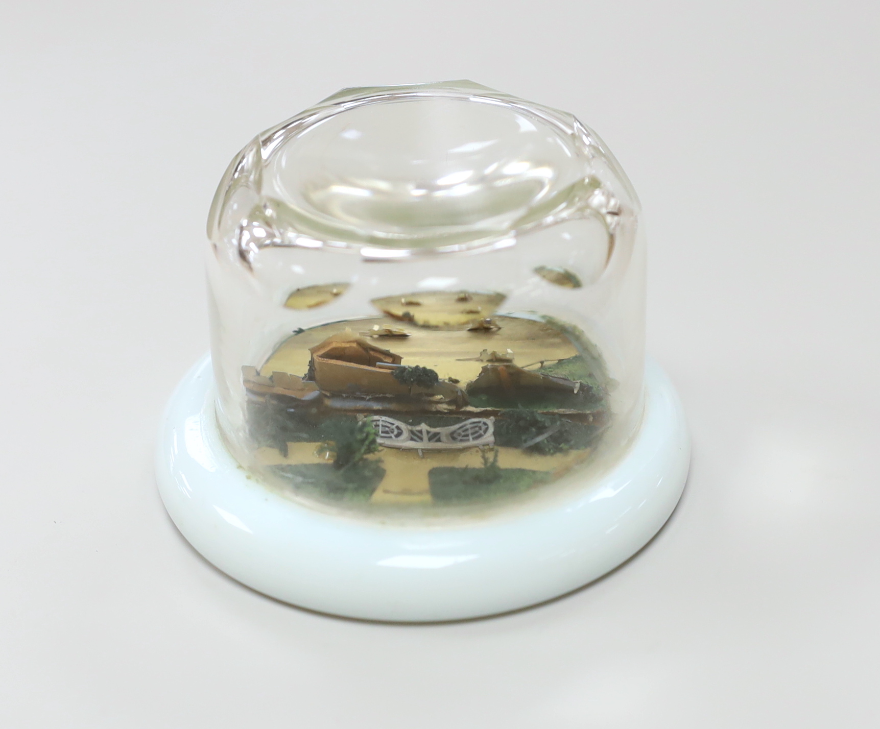 An unusual 19th century Continental diorama cut card glass cased paperweight, 6cm high